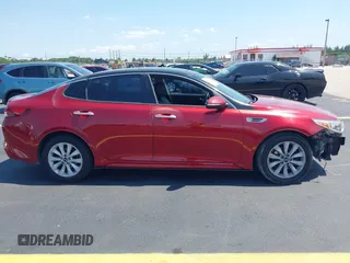 2018 Kia Optima S z VIN 5XXGT4L33JG235933, wystawiony jako IAAI lot #42260202 z przebiegiem 126 833 mil mil oraz . Historia ofert i sprzedaży dostępna na DreamBid. Obrazek 14.