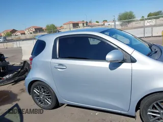 2014 Scion iQ with VIN JTNJJXB02EJ027026, listed as a IAAI auction lot 42619439 with 103,261 mi miles and . Bid and sale history available at DreamBid. Image 13.
