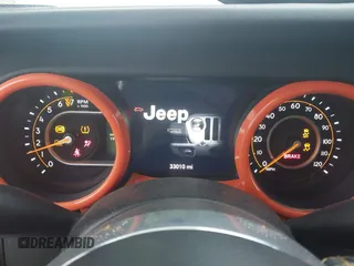 2023 Jeep Gladiator Overland z VIN 1C6HJTFGXPL522706, wystawiony jako IAAI lot #41923655 z przebiegiem 33 010 mil mil oraz . Historia ofert i sprzedaży dostępna na DreamBid. Obrazek 7.