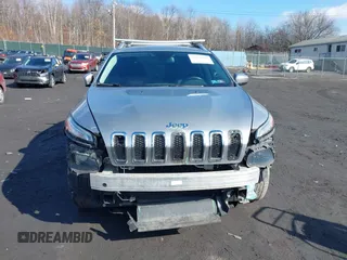 2014 Jeep Cherokee Altitude with VIN 1C4PJMCB5EW167961, listed as a IAAI auction lot 41660440 with 88,705 mi miles and . Bid and sale history available at DreamBid. Image 12.