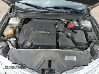 2016 Lincoln MKZ z VIN 3LN6L2GK3GR623560, wystawiony jako Copart lot #55337905 z przebiegiem 167 403 mil mil oraz Szkoda całkowita • Salvage title. Historia ofert i sprzedaży dostępna na DreamBid. Obrazek 11.