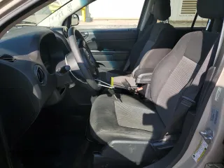 2017 Jeep Compass Sport SE with VIN 1C4NJCBA3HD134788, listed as a Copart auction lot 55398295 with 145,241 mi miles and Salvage title. Bid and sale history available at DreamBid. Image 7.