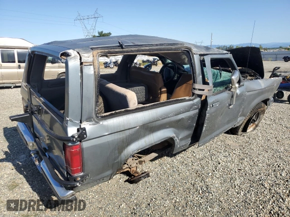 1989 Ford Bronco with VIN 1FMCU14T0KUA33910, listed as a Copart auction lot 57730195 with 53,335 mi miles and Salvage title. Bid and sale history available at DreamBid. Image 3.
