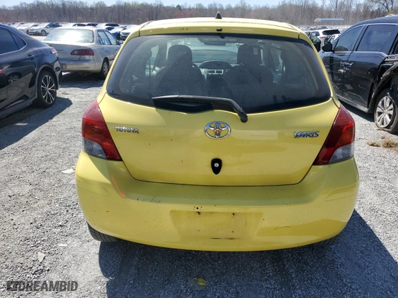 2009 Toyota Yaris with VIN JTDJT903195276164, listed as a Copart auction lot 50129115 with 165,824 mi miles and Salvage Title. Bid and sale history available at carsss.com. Image 6.
