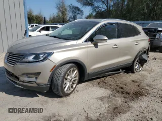 2015 Lincoln MKC with VIN 5LMCJ1A9XFUJ45277, listed as a Copart auction lot 50164715 with 71,557 mi miles and Salvage Title. Bid and sale history available at DreamBid. Image 1.