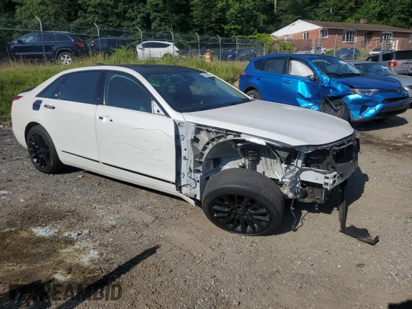 2016 Cadillac CT6 Luxury AWD z VIN 1G6KD5RS0GU165602, wystawiony jako Copart lot #61066485 z przebiegiem 46 006 mil mil oraz Szkoda całkowita • Salvage title. Historia ofert i sprzedaży dostępna na DreamBid. Obrazek 4.