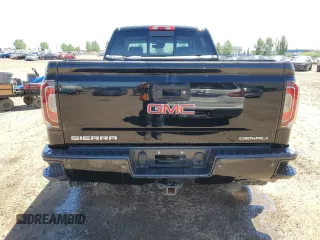 2017 GMC Sierra 1500 Denali z VIN 3GTU2PEJ7HG133884, wystawiony jako Copart lot #58940485 z przebiegiem 241 697 mil mil oraz Czysty tytuł • Clean title. Historia ofert i sprzedaży dostępna na DreamBid. Obrazek 6.