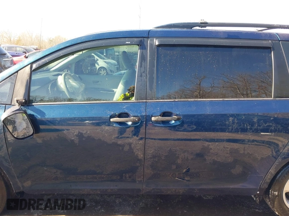 2012 Toyota Sienna with VIN 5TDKA3DCXCS013173, listed as a IAAI auction lot 41437317 with 175,263 mi miles and . Bid and sale history available at DreamBid. Image 15.