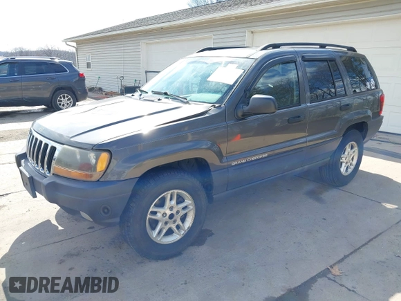 2003 Jeep Grand Cherokee Laredo with VIN 1J4GX48S53C504225, listed as a IAAI auction lot 41879669 with 247,246 mi miles. Bid and sale history available at carsss.com. Image 19.