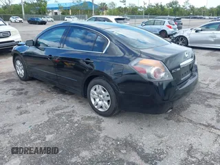 2010 Nissan Altima 2.5 S with VIN 1N4AL2AP9AC173959, listed as a IAAI auction lot 42010669 with 154,357 mi miles. Bid and sale history available at carsss.com. Image 3.