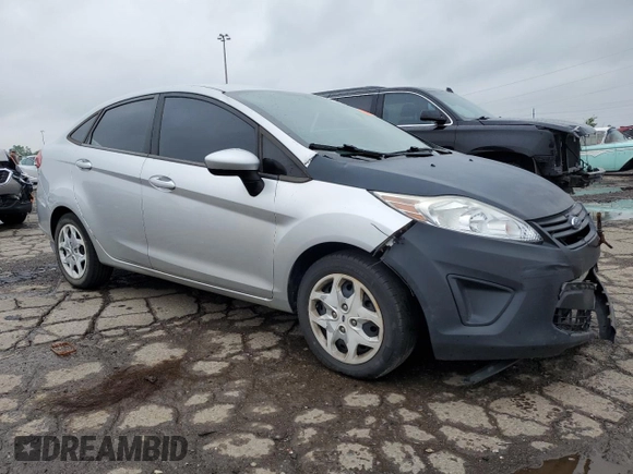 2012 Ford Fiesta SE z VIN 3FADP4BJ4CM125634, wystawiony jako Copart lot #59911995 z przebiegiem 168 371 mil mil oraz Czysty tytuł • Clean title. Historia ofert i sprzedaży dostępna na DreamBid. Obrazek 4.