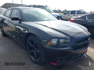 2014 Dodge Charger RT z VIN 2C3CDXCT7EH356453, wystawiony jako IAAI lot #41484769 z przebiegiem 130 225 mil mil oraz . Historia ofert i sprzedaży dostępna na DreamBid. Obrazek 1.