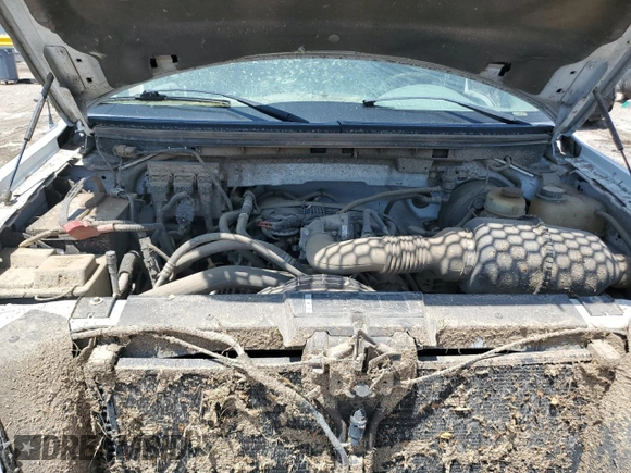 2007 Ford F-150 XL z VIN 1FTRF12227NA58960, wystawiony jako Copart lot #60405635 z przebiegiem 123 290 mil mil oraz Szkoda całkowita • Salvage title. Historia ofert i sprzedaży dostępna na DreamBid. Obrazek 11.