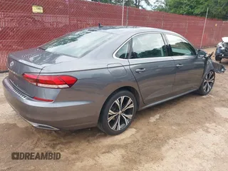 2021 Volkswagen Passat SE with VIN 1VWSA7A34MC019045, listed as a IAAI auction lot 42164157 with 78,436 mi miles and . Bid and sale history available at DreamBid. Image 4.