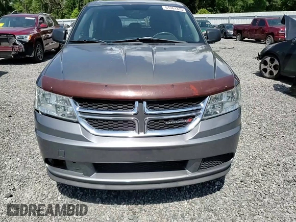 2013 Dodge Journey American Value with VIN 3C4PDCAB8DT566999, listed as a Copart auction lot 61361315 with 183,897 mi miles and Salvage title. Bid and sale history available at DreamBid. Image 14.