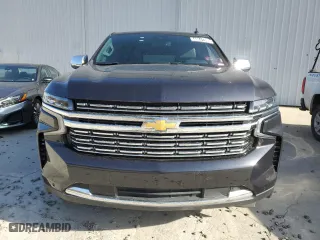2023 Chevrolet Suburban Premier with VIN 1GNSCFKD5PR394675, listed as a Copart auction lot 49641395 with 56,946 mi miles and Salvage Title. Bid and sale history available at carsss.com. Image 5.