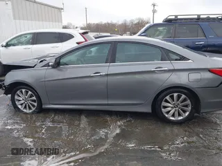 2014 Hyundai Sonata SE with VIN 5NPEC4AC5EH894598, listed as a IAAI auction lot 41242457 with 153,635 mi miles and . Bid and sale history available at DreamBid. Image 13.