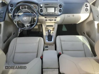 2014 Volkswagen Tiguan SE with VIN WVGAV3AX9EW038118, listed as a Copart auction lot 56329625 with 134,620 mi miles and Salvage title. Bid and sale history available at DreamBid. Image 8.