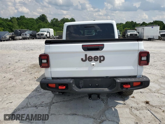 2021 Jeep Gladiator Rubicon z VIN 1C6JJTBG0ML624275, wystawiony jako Copart lot #62840275 z przebiegiem Nie podano mil oraz Szkoda całkowita • Salvage title. Historia ofert i sprzedaży dostępna na DreamBid. Obrazek 6.