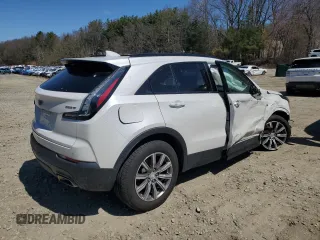 2021 Cadillac XT4 AWD Sport z VIN 1GYFZFR40MF006208, wystawiony jako Copart lot #53661335 z przebiegiem 24 785 mil mil oraz Szkody całkowita. Historia ofert i sprzedaży dostępna na DreamBid. Obrazek 3.