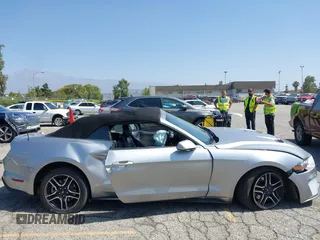 2021 Ford Mustang EcoBoost z VIN 1FATP8UH2M5120162, wystawiony jako IAAI lot #42561125 z przebiegiem 55 360 mil mil oraz . Historia ofert i sprzedaży dostępna na DreamBid. Obrazek 14.