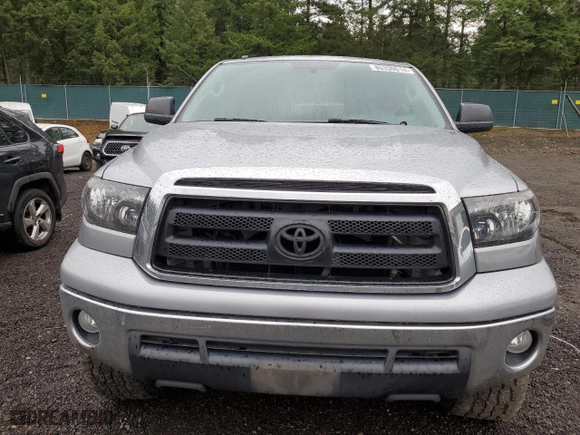 2013 Toyota Tundra 4WD Truck with VIN 5TFDM5F19DX047348, listed as a Copart auction lot 85330014 with 128,205 mi miles and Salvage Title. Bid and sale history available at carsss.com. Image 5.