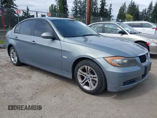 2008 BMW 3 Series 328i with VIN WBAVC53518F008938, listed as a IAAI auction lot 42150683 with 129,989 mi miles. Bid and sale history available at carsss.com. Image 1.