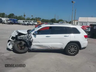 2014 Jeep Grand Cherokee Limited with VIN 1C4RJFBG7EC236572, listed as a IAAI auction lot 42134807 with 170,342 mi miles and . Bid and sale history available at DreamBid. Image 14.