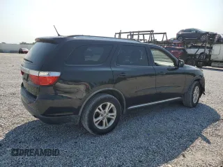 2012 Dodge Durango SXT with VIN 1C4RDJAG0CC138881, listed as a Copart auction lot 60749865 with 241,571 mi miles and Clean title. Bid and sale history available at DreamBid. Image 3.