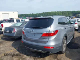 2013 Hyundai Santa Fe Limited z VIN KM8SR4HF1DU005619, wystawiony jako IAAI lot #42149533 z przebiegiem 135 268 mil mil oraz . Historia ofert i sprzedaży dostępna na DreamBid. Obrazek 4.