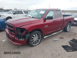 2014 Ram 1500 Tradesman with VIN 1C6RR6FG4ES454808, listed as a IAAI auction lot 41368359 with 233,684 mi miles and . Bid and sale history available at DreamBid. Image 2.