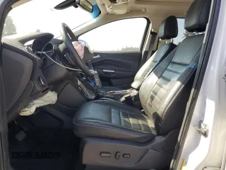 2016 Ford Escape Titanium with VIN 1FMCU9JX5GUC44579, listed as a Copart auction lot 54974965 with 113,776 mi miles and Salvage Title. Bid and sale history available at DreamBid. Image 7.