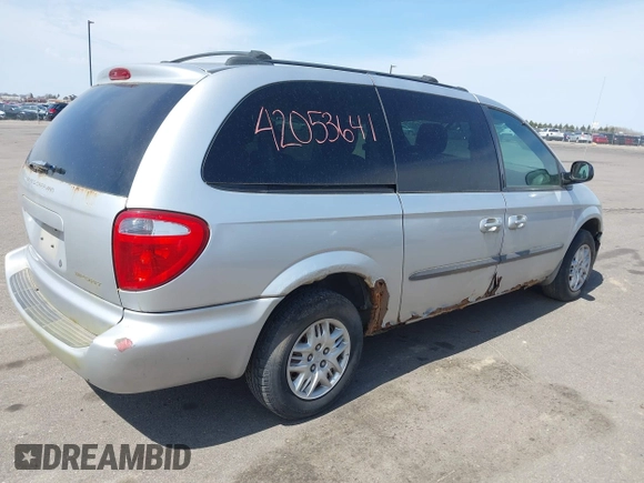 2003 Dodge Grand Caravan with VIN 2D4GP44303R281610, listed as a IAAI auction lot 42053641 with 196,877 mi miles and . Bid and sale history available at DreamBid. Image 4.
