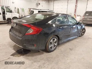 2019 Honda Civic Sedan LX with VIN 2HGFC2F69KH555697, listed as a IAAI auction lot 41664312 with 112,993 mi miles. Bid and sale history available at carsss.com. Image 4.