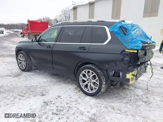 2021 BMW X7 xDrive40i with VIN 5UXCW2C04M9G14524, listed as a IAAI auction lot 41440163 with 49,046 mi miles. Bid and sale history available at carsss.com. Image 3.
