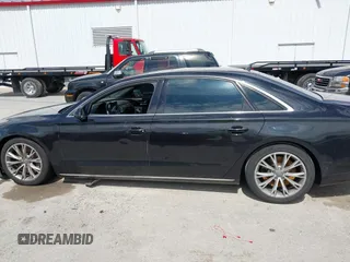 2012 Audi A8 L with VIN WAURVAFD5CN038949, listed as a IAAI auction lot 41914575 with 85,634 mi miles. Bid and sale history available at carsss.com. Image 14.