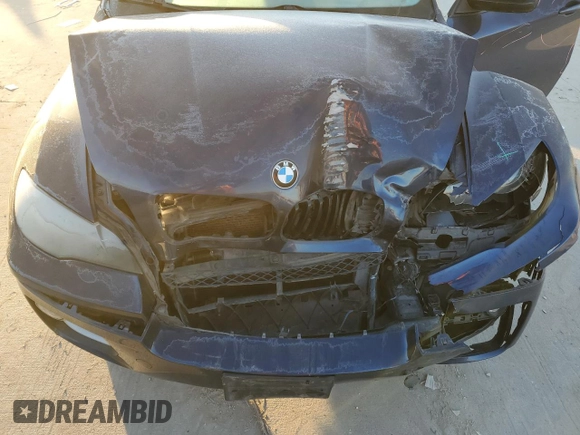2014 BMW X6 xDrive35i with VIN 5UXFG2C52E0H09997, listed as a Copart auction lot 88328005 with 164,386 mi miles and Salvage Title. Bid and sale history available at carsss.com. Image 12.