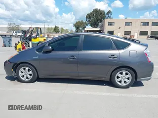 2007 Toyota Prius z VIN JTDKB20U273215633, wystawiony jako IAAI lot #41955538 z przebiegiem 172 957 mil mil oraz . Historia ofert i sprzedaży dostępna na DreamBid. Obrazek 14.