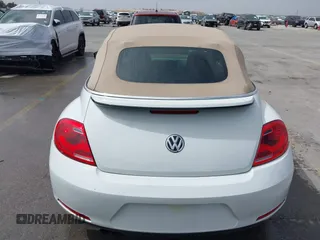 2015 Volkswagen Beetle 1.8T w/Tech with VIN 3VW517AT4FM812294, listed as a IAAI auction lot 41753967 with 59,857 mi miles and . Bid and sale history available at DreamBid. Image 16.