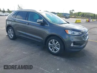 2020 Ford Edge SEL with VIN 2FMPK4J90LBA60985, listed as a IAAI auction lot 41590512 with 141,733 mi miles. Bid and sale history available at carsss.com. Image 1.