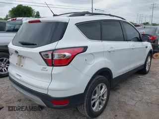 2017 Ford Escape SE with VIN 1FMCU0GD0HUD19621, listed as a IAAI auction lot 42123026 with 105,664 mi miles and . Bid and sale history available at carsss.com. Image 4.
