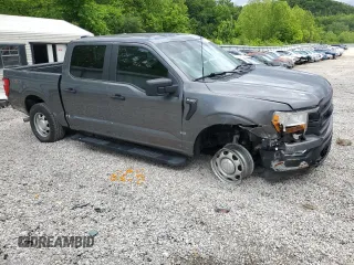 2022 Ford F-150 XL with VIN 1FTEW1EP9NKD36368, listed as a Copart auction lot 57140275 with 52,153 mi miles and Salvage title. Bid and sale history available at DreamBid. Image 4.