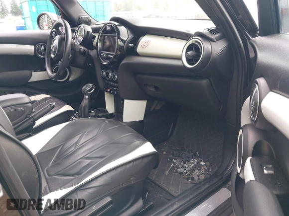 2015 MINI Hardtop 4 Door with VIN WMWXS5C58FT833420, listed as a IAAI auction lot 42560244 with 115,446 mi miles and . Bid and sale history available at DreamBid. Image 5.
