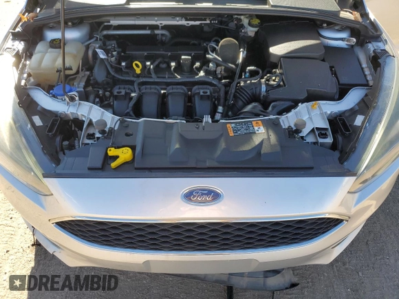 2016 Ford Focus SE with VIN 1FADP3F29GL314719, listed as a Copart auction lot 77686334 with 76,515 mi miles and Salvage title. Bid and sale history available at DreamBid. Image 12.