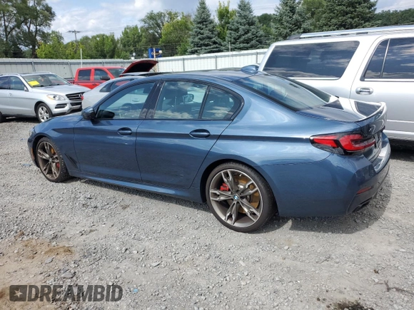 2023 BMW 5 Series M550i xDrive z VIN WBA13BK02PCN82953, wystawiony jako Copart lot #68124264 z przebiegiem 10 010 mil mil oraz Szkoda całkowita • Salvage title. Historia ofert i sprzedaży dostępna na DreamBid. Obrazek 2.