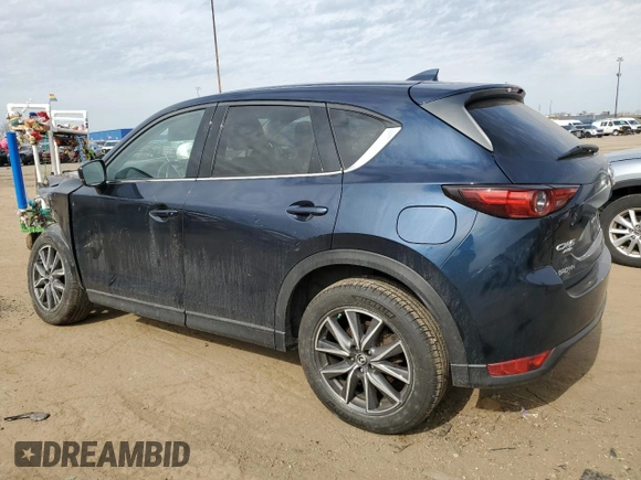2017 Mazda CX-5 Grand Touring with VIN JM3KFBDL8H0163179, listed as a Copart auction lot 49866865 with 53,066 mi miles and Salvage Title. Bid and sale history available at carsss.com. Image 2.