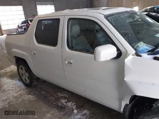 2014 Honda Ridgeline RTL with VIN 5FPYK1F55EB012490, listed as a IAAI auction lot 41391884 with 130,121 mi miles. Bid and sale history available at carsss.com. Image 13.