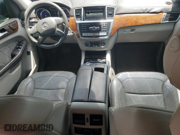 2014 Mercedes-Benz GL 450 z VIN 4JGDF7CE0EA303471, wystawiony jako Copart lot #58673045 z przebiegiem 182 455 mil mil oraz Tytuł czysty. Historia ofert i sprzedaży dostępna na DreamBid. Obrazek 8.