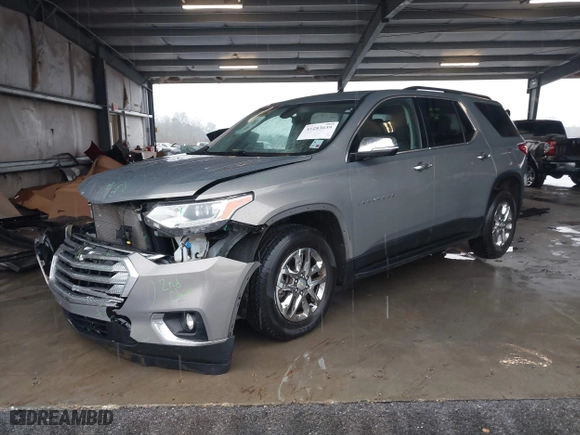 2019 Chevrolet Traverse LT Cloth with VIN 1GNEVGKW1KJ135509, listed as a IAAI auction lot 41283639 with 77,327 mi miles. Bid and sale history available at carsss.com. Image 17.