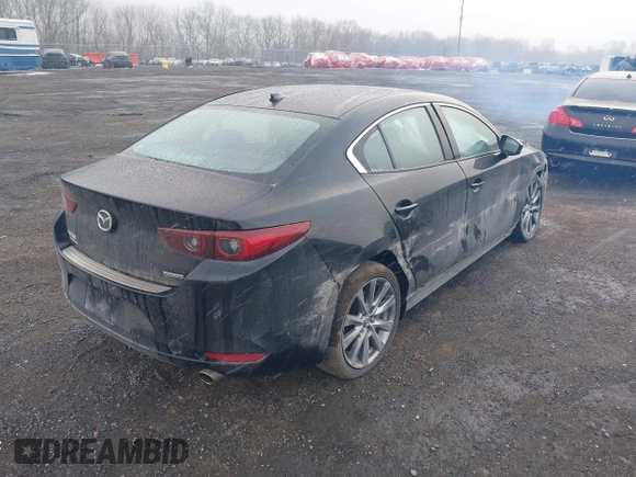 2022 Mazda 3 Premium with VIN 3MZBPADL7NM316513, listed as a IAAI auction lot 41347291 with 47,351 mi miles and . Bid and sale history available at DreamBid. Image 4.